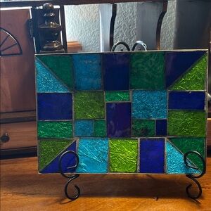Vibrant Stained Glass Mosaic Art in Blue and Green